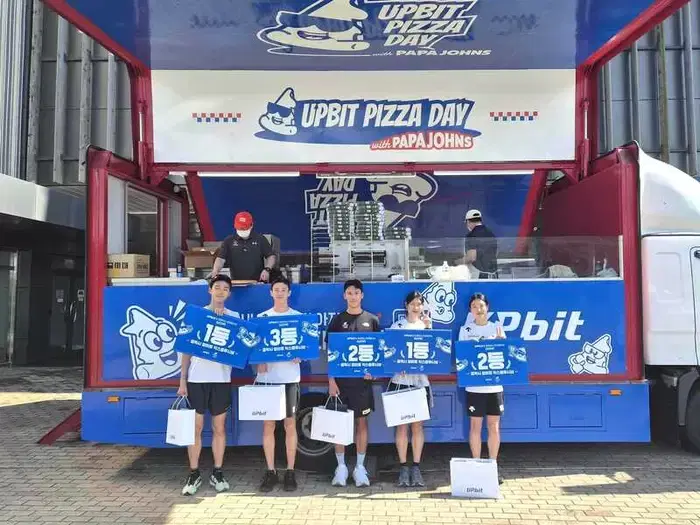 업비트, 왜 국가대표 선수촌에 피자트럭 보냈나